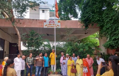 With Vedic spirit, Arya Samaj members hoist the flag.